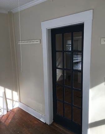 Inside sun room - door closed to living room