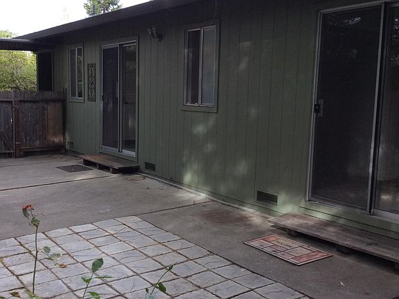 Sliding doors from dining room and bedroom to patio