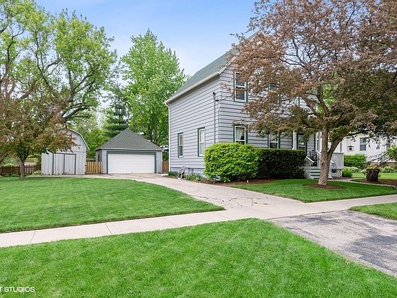 Spacious two-car garage and an extra large barn-like shed! Plenty of space in this driveway for park