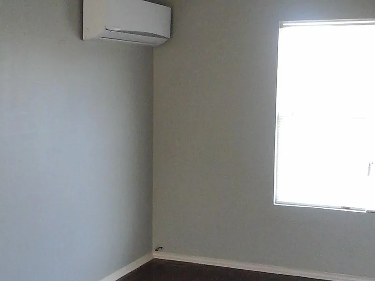 Bedroom #1 with Ductless, High-Efficiency A/C--Heater System