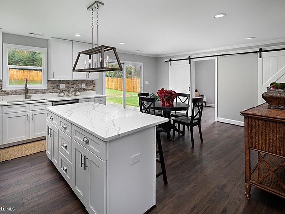 STEP DOWN KITCHEN AS SEEN FROM DINING ROOM