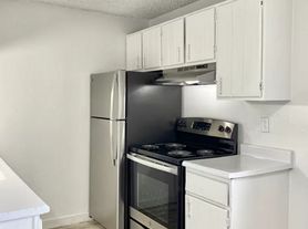 15571-15573 E 13th Avenue