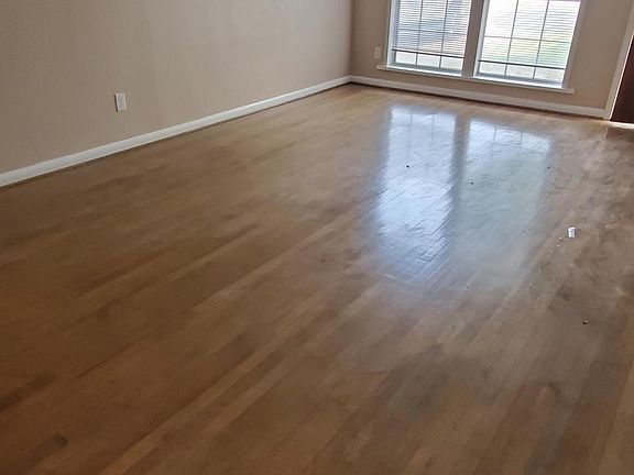 Original hardwood floors just refinished, plenty of natural light