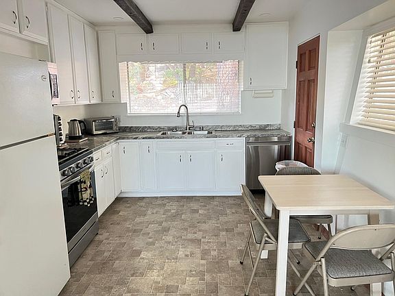 Newly remodeled kitchen and open eats in dining area.