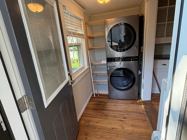 Entry hall with laundry area.