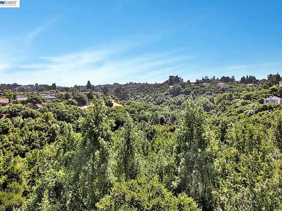The green views from LR and both bedrooms provide fresh air and peaceful atmosphere