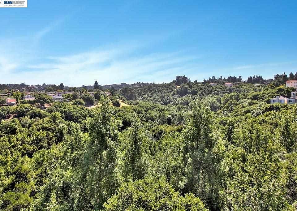 The green views from LR and both bedrooms provide fresh air and peaceful atmosphere