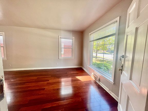 Front Entry - Gorgeous Cherry Hardwoods & Updated Windows Throughout