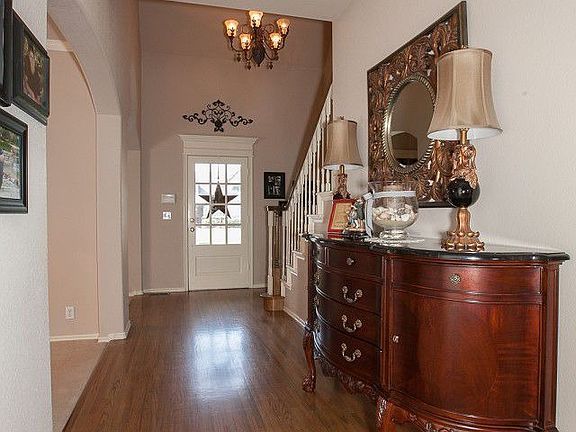 Formal dining room opens to kitchen