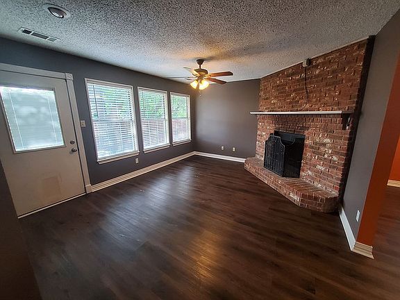 Den with Fireplace 15.5'X13'