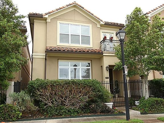Home is gated at front entry and has automatic drive through gate at rear.