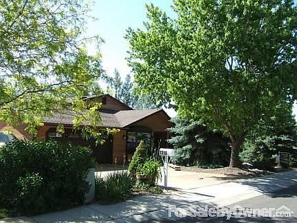 1310 N. Aztec St
						:
						Garage and Driveway