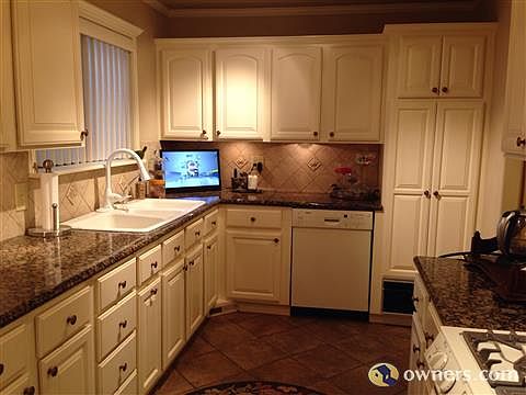 Roll out drawers in pantry with a warming oven