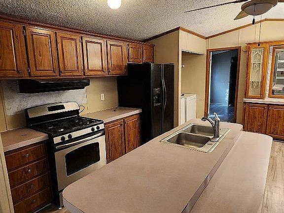 Kitchen with island, fridge,stove