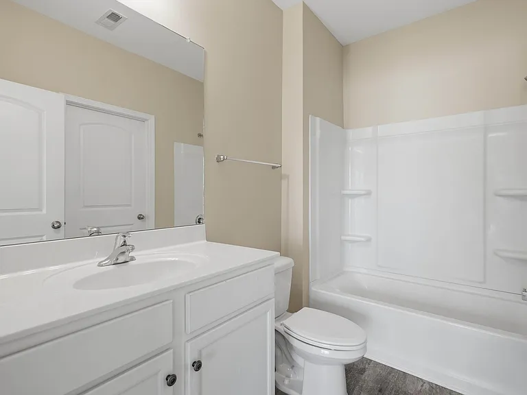Shower tub combo. Entrance from hallway or bedroom.