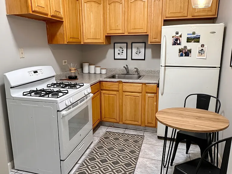 Kitchen- This room has been virtually staged using AI to help visualize its layout and design potential.
