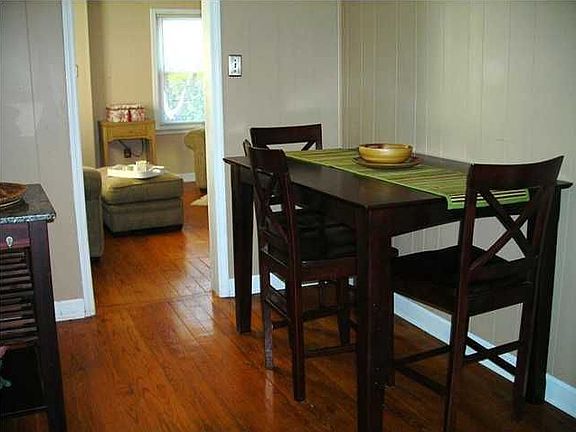 The dining area is open to the kitchen and the living room.
