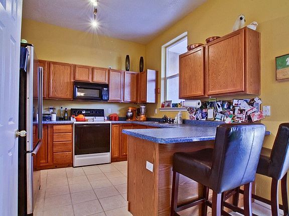 3rd image of 4544 Holiday Breeze Pl NE