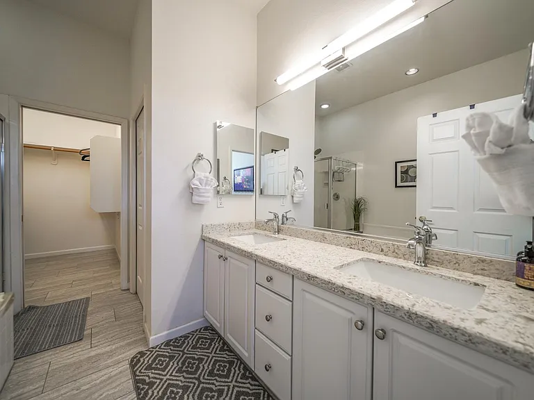 Primary en-suite Quartz Counters, Dual sinks, large closet, private water closet.