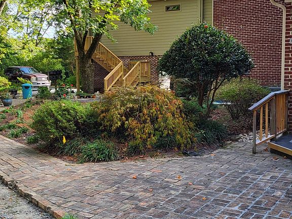 Angle view of front entrance of Unit I. Note the beautiful pecan tree