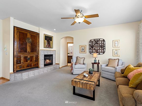 Living room with cozy gas fireplace.