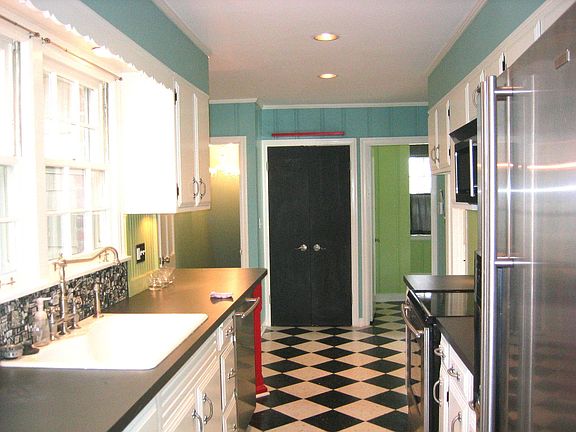 Kitchen with matching stainless steel Jenn-Air appliances.