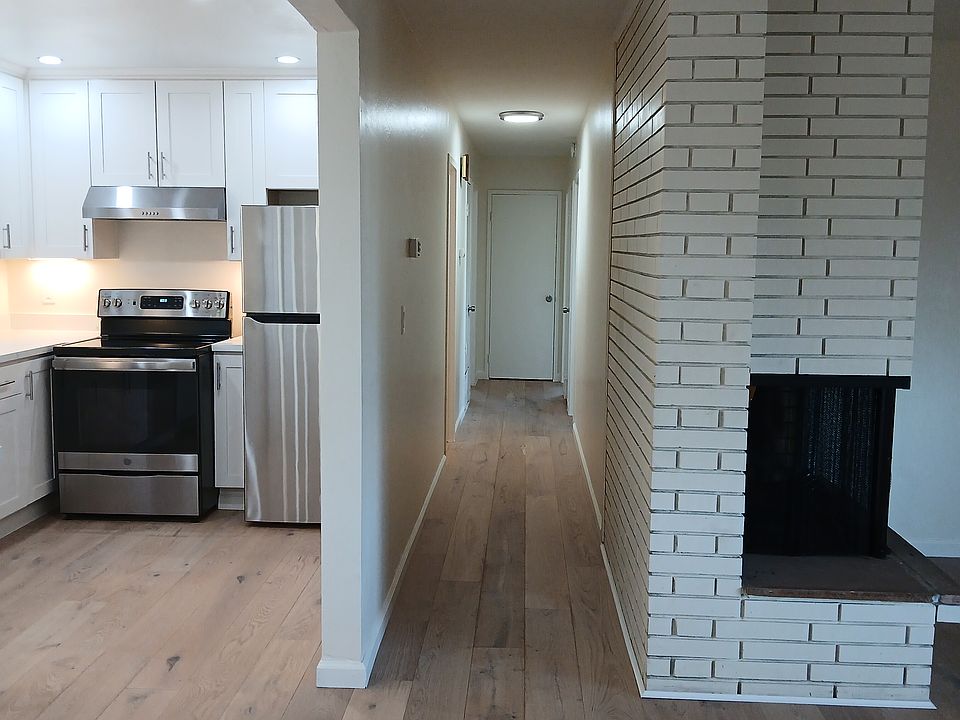 Hallway with 2 closets in hallway.