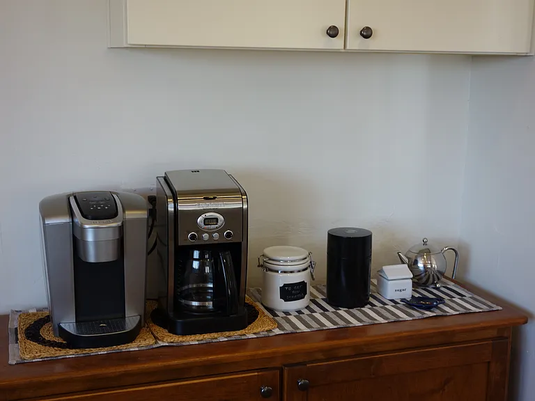 Coffee bar with Keuirg k-cup, Cuisinart 12 cup, French Press, Tea kettle.
