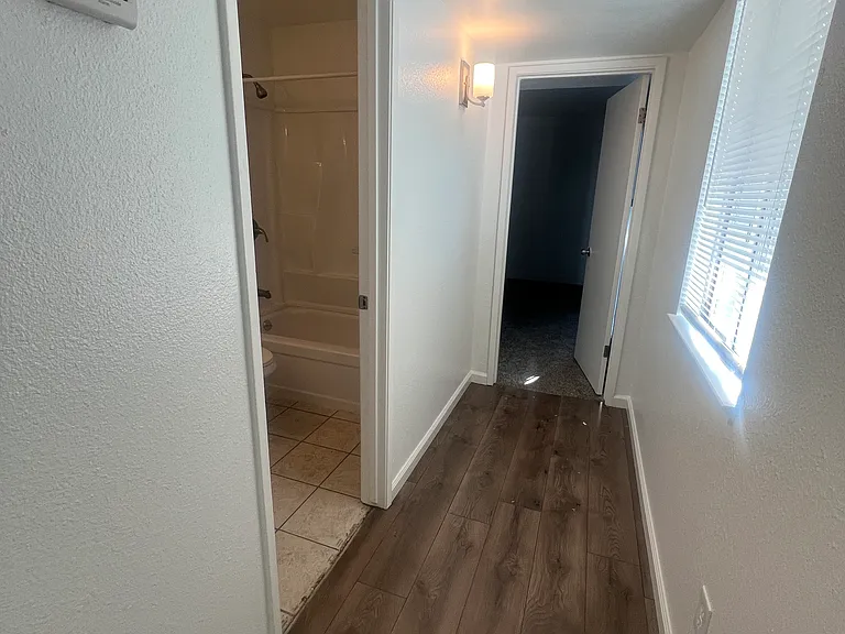 Hall to guest bath and Primary bedroom