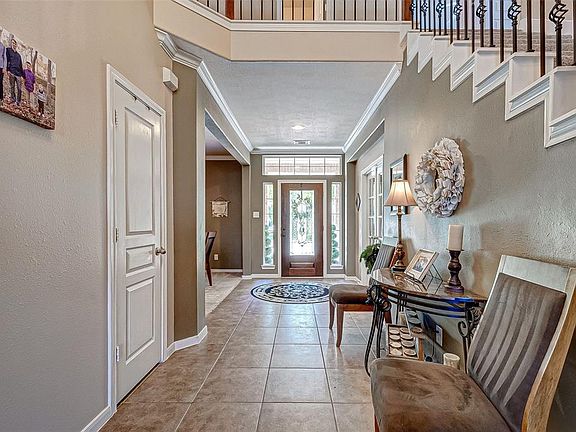Beautiful foyer is so inviting! Your family and guests will feel right at home!