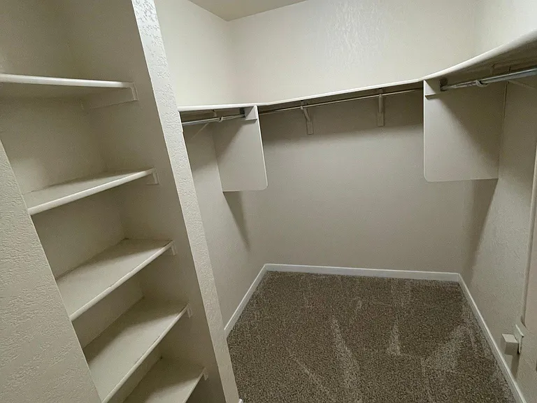 Master Closet includes custom shelving