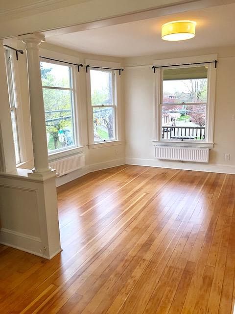 Living Room - Huge bay windows and access to Deck