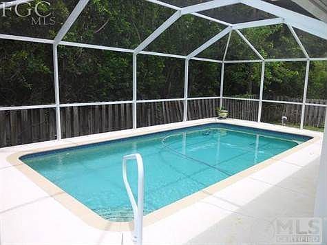 BELOW GROUND POOL AREA WITH PRIVATE REAR SETTING!