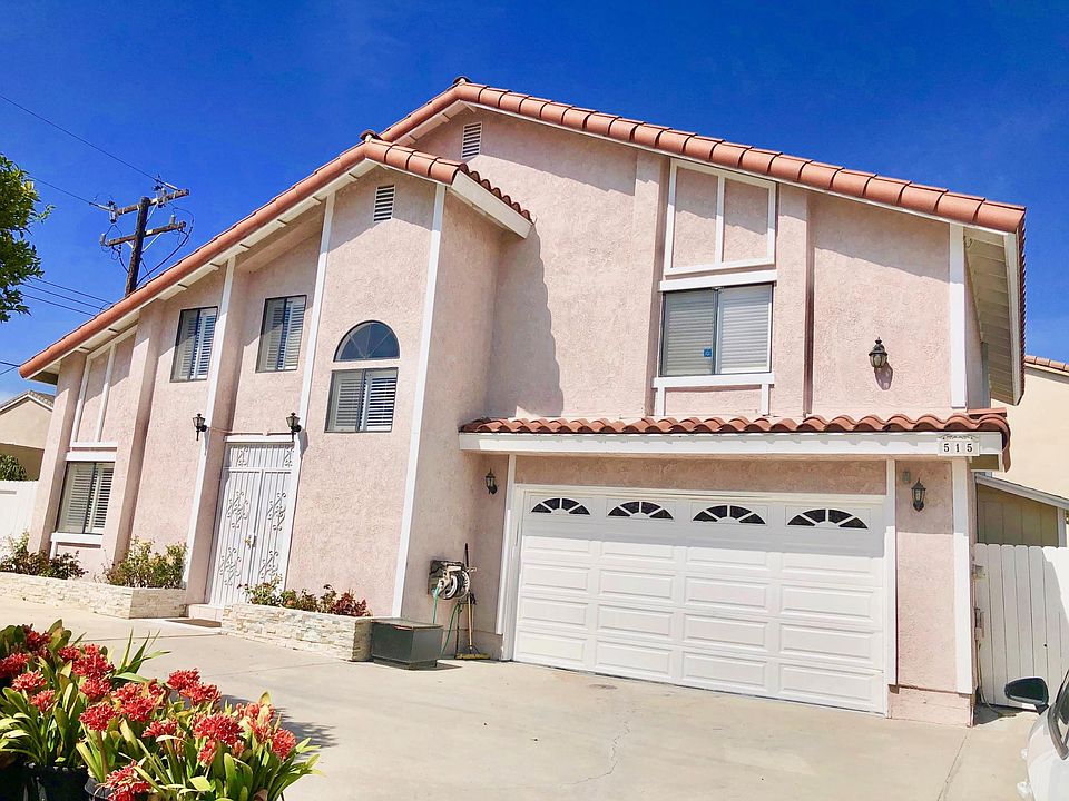 Front view, 2 Car Garage with a private driveway