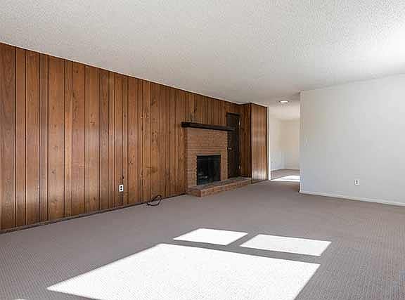Fireplace in living room, off of foyer