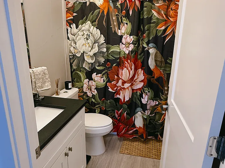 Second bathroom with shower and tub