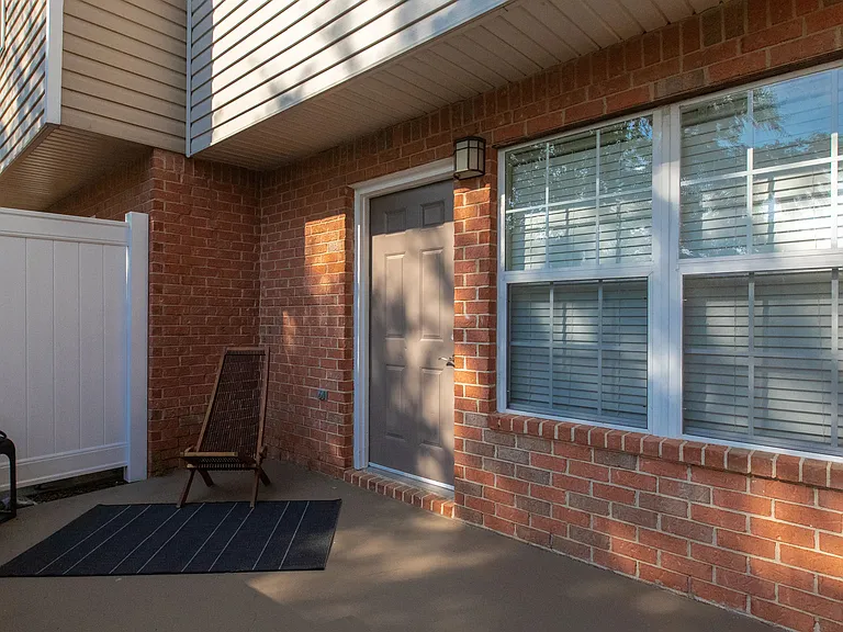 Step onto your private patio, your personal retreat connecting you to nature and relaxation.
