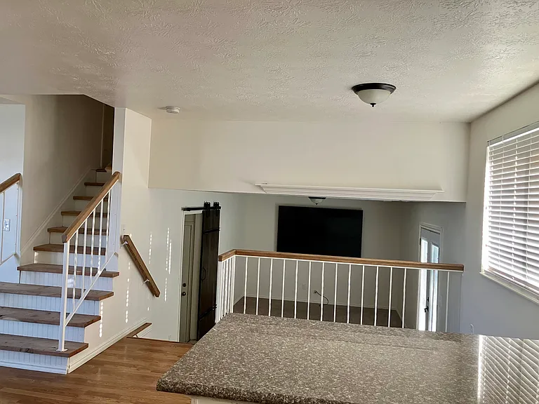 View from kitchen to dining room and family room