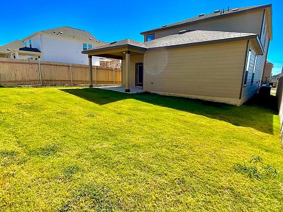 Massive Backyard space for pets and family. (Back View).