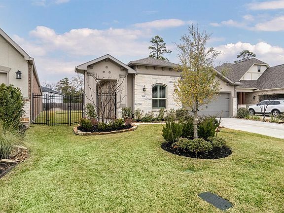 The home has a gated entry for privacy.
