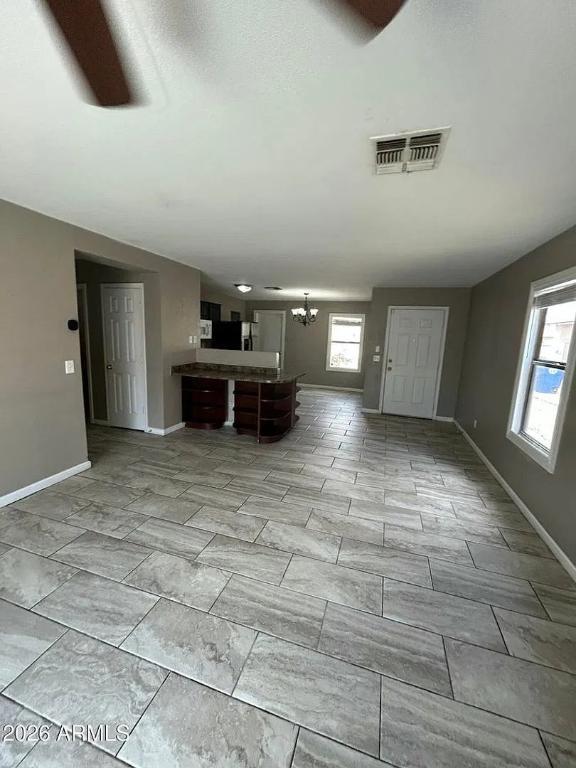 El Mirage Home with Tile Flooring Throughout — Photo 2
