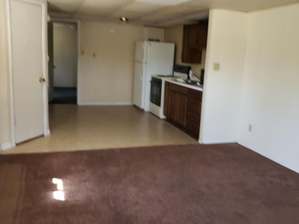 Living room looking into kitchen