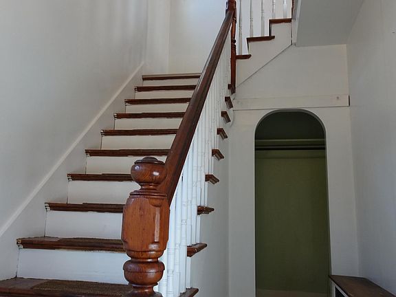 A private front entry has a closet on the first floor