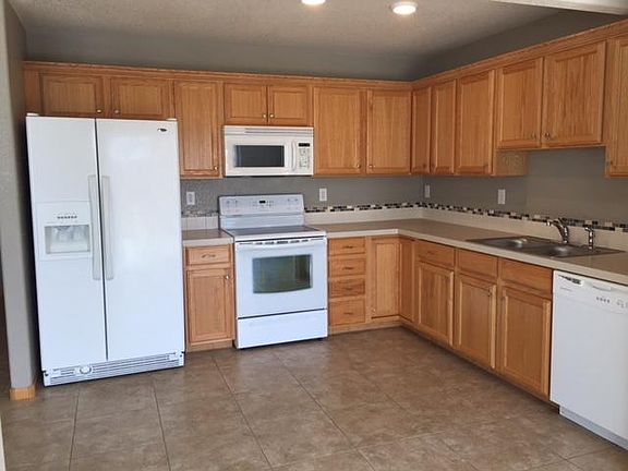 Open kitchen with like new appliances