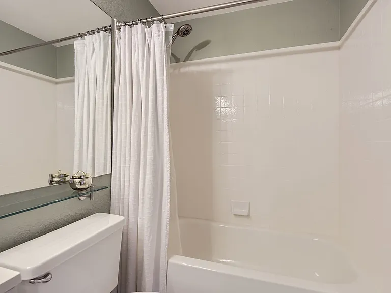 Upstairs bathroom with tub