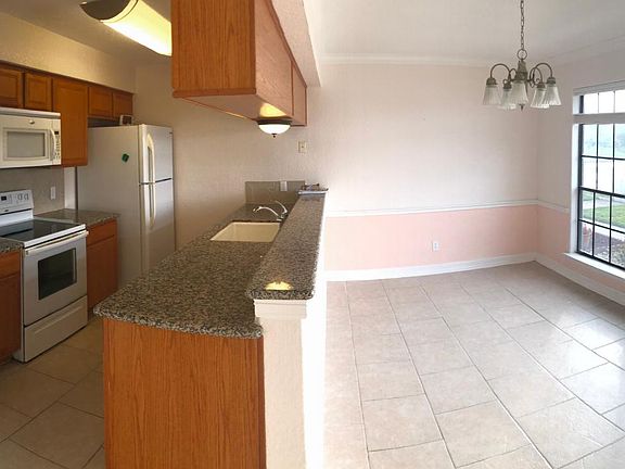 Open concept of kitchen to dining room.