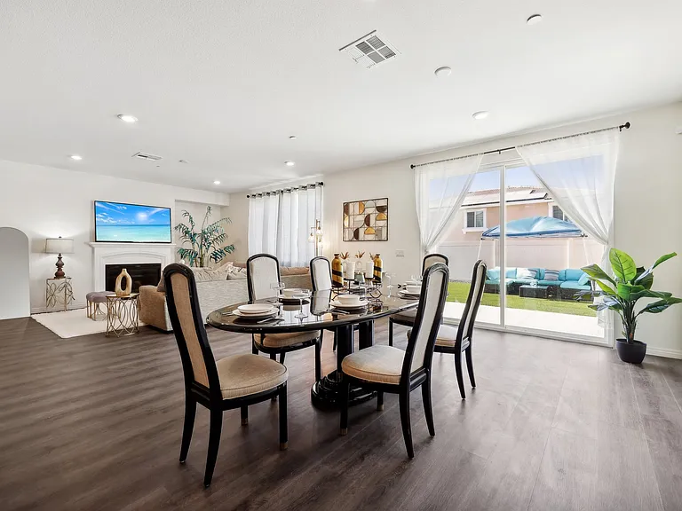 Our dining area bathed in natural light creates the perfect atmosphere. Where every meal feels special!
