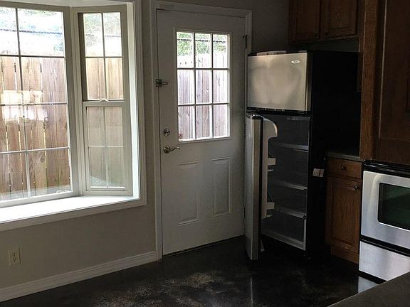 Kitchen View with private fenced in patio