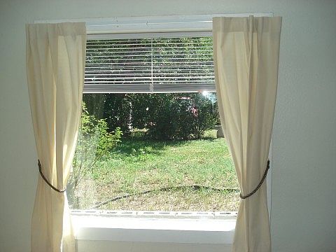 Large Picture Window Lets Light Iin & Looks Out on the Yard