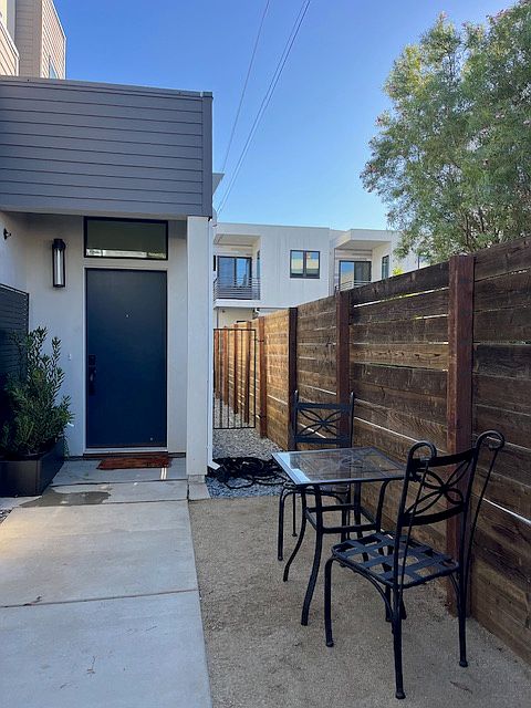Your private entrance has a gated entry and large front porch. You can lounge, dine and grow your own vegetables in this spacious, private front yard.